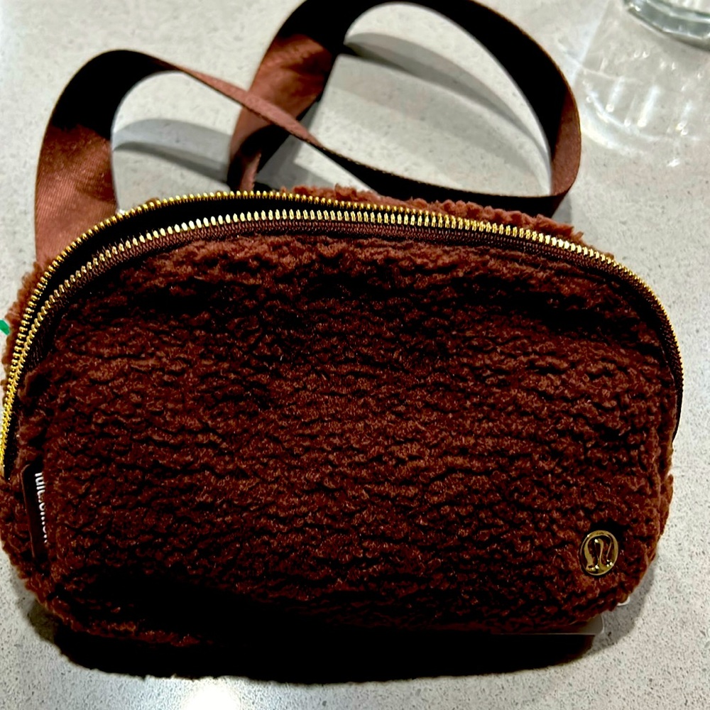 Brown Lululemon waist or cross body bag .